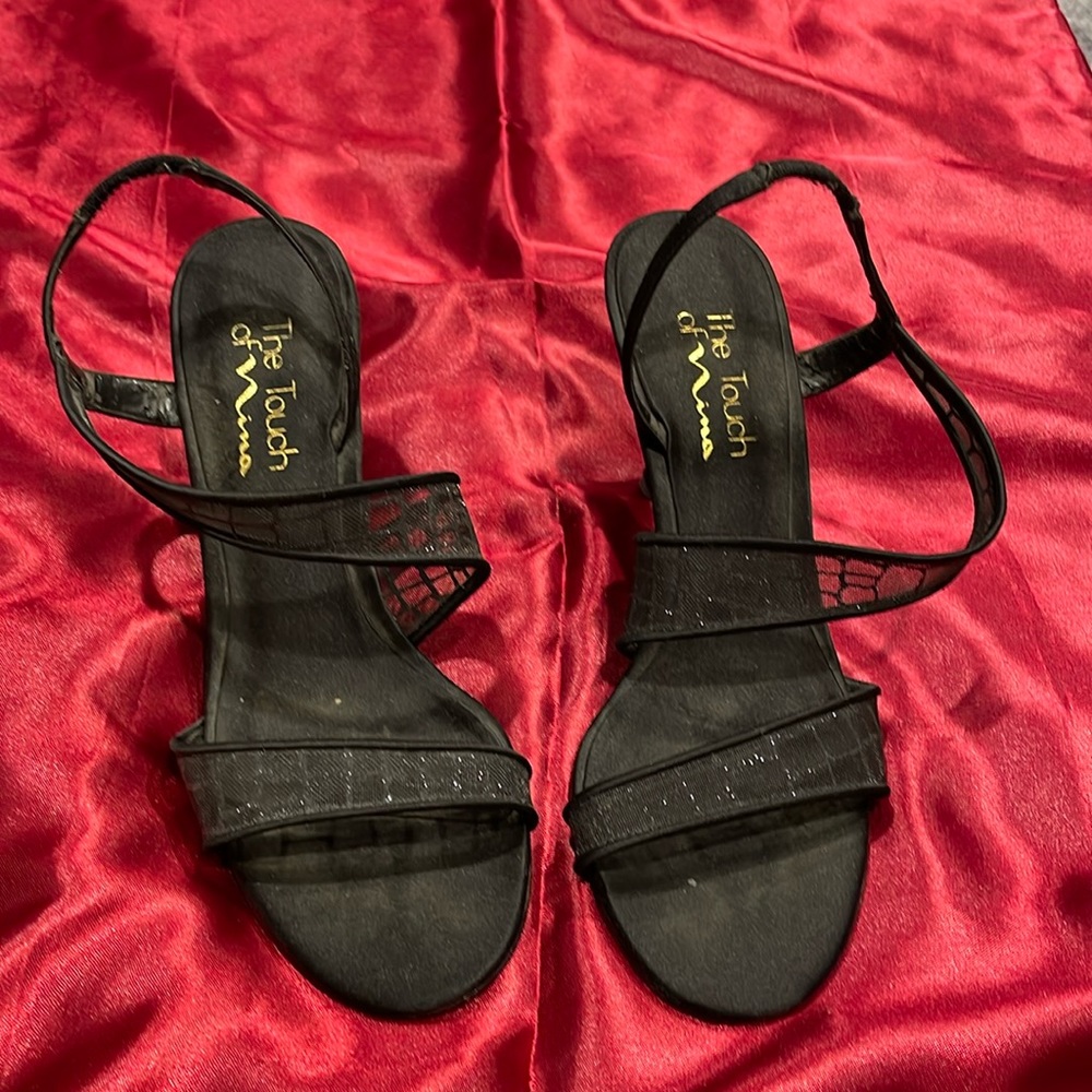 Ladies higher heel strappy shoes.